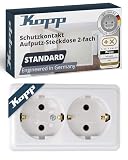 Kopp STANDARD 2-fach Schutzkontakt-Steckdose in Arktis-Weiß - Aufputz-Steckdose inkl. Zugentlastung - IP20 Doppelsteckdose-Aufputz für Keller, Werkstatt & Garage - Feuchtraum-Wandsteckdose 16A / 250V~