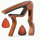 Moreyes Kapodaster für Akustikgitarren, Ukulele, E-Gitarre, Bass, inkl. holzfarbenen Plektren Mirabow