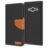 Conie Samsung Galaxy Xcover 3 Hülle für Galaxy Xcover 3 Tasche, Textil Denim Jeans Look Booklet Cover Handytasche Klapphülle Etui mit Kartenfächer, Schw